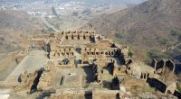 Takht-i-Bahi Monastery view with Mardan city in background